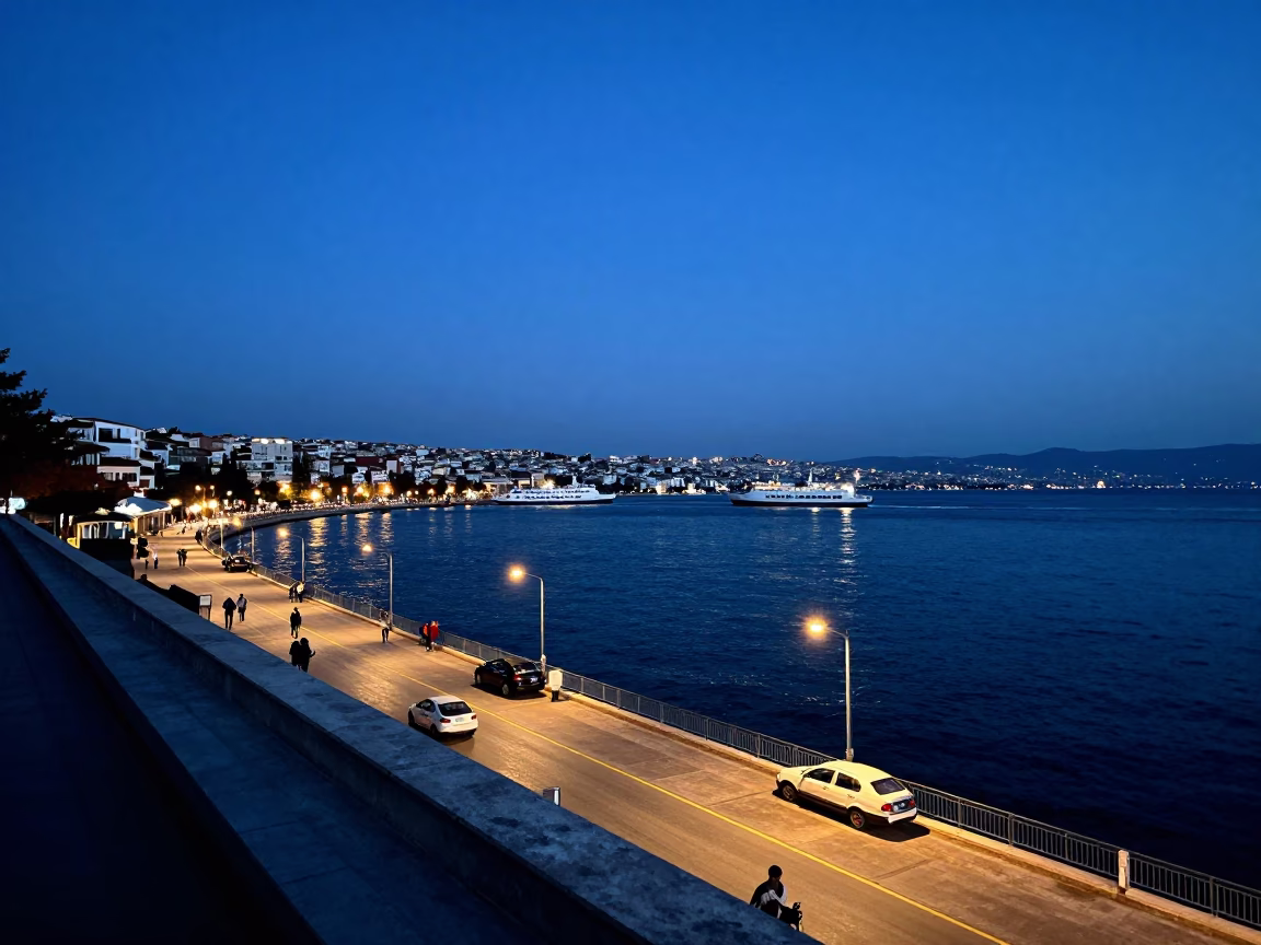 Kordon Promenade Evening View of Izmir Bay and Kemeraltı Bridge Under Twilight in in Izmir, Turkey