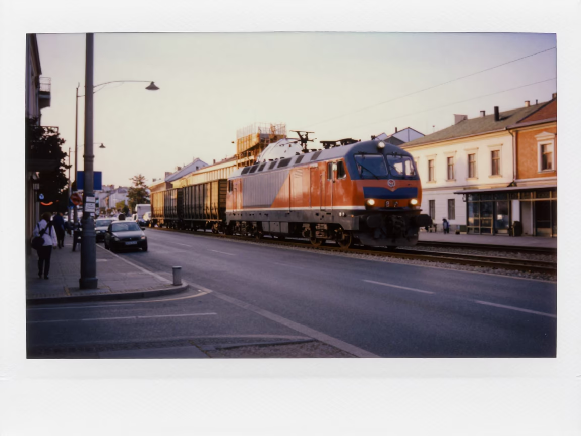 Krakow Poland Evening Street Scene with Freight Train and Construction Site in in Krakow, Poland