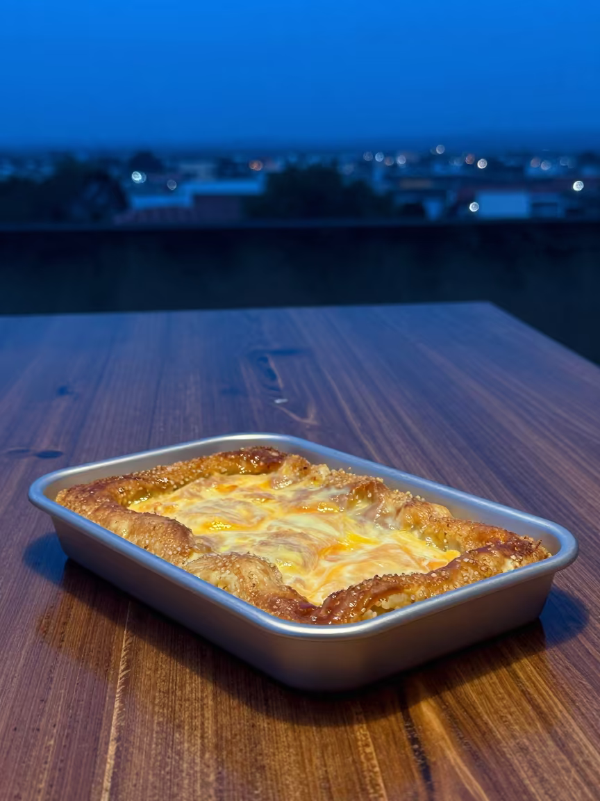 Kunafa Tray Melted Cheese San Fernando Apure in on a rustic wooden table in San Fernando de Apure