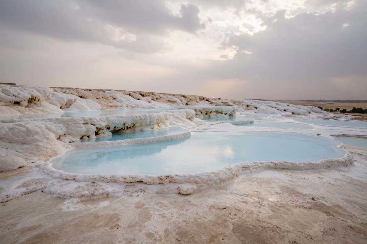 Kuwait Valley Travertine Terraces Blue Pools in across a wide valley floor in Kuwait