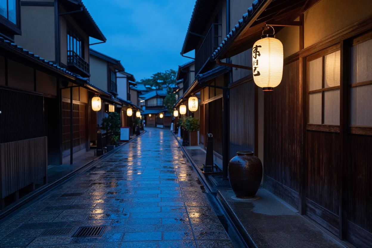 Kyoto Evening Street Scene with Traditional Lanterns and Wet Pavement Reflecting City Lights in in Kyoto, Japan