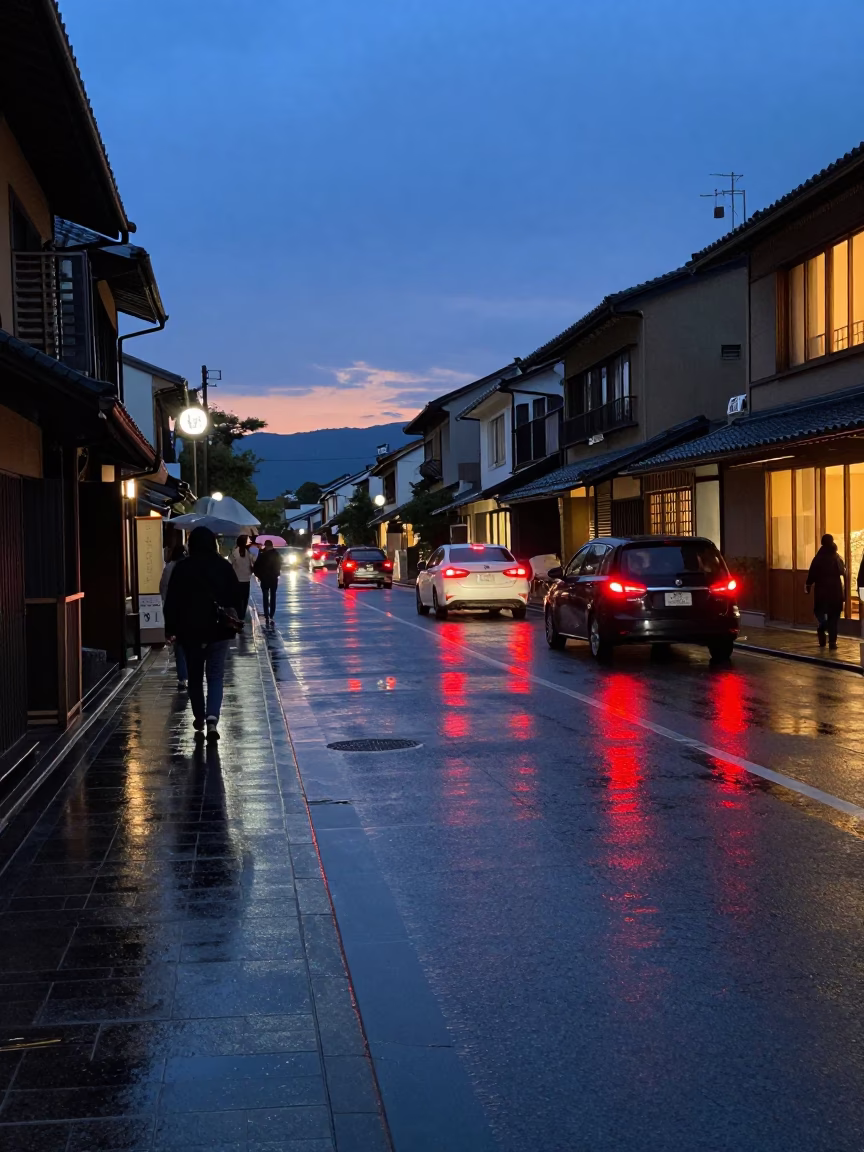 Kyoto Indigo Twilight Street Scene with Puddle Reflections and Tramcar in in Kyoto, Japan