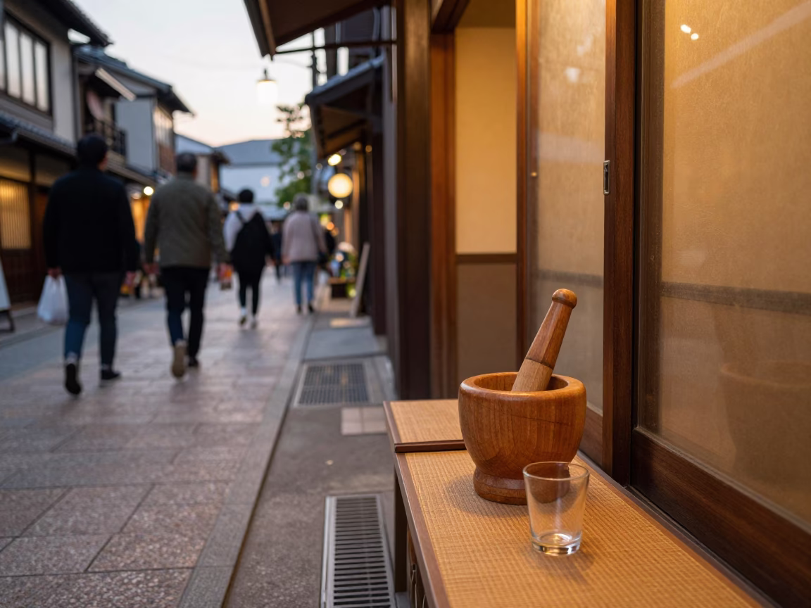 Kyoto Japan Evening Street Scene with Mortar Pestle and Glass Drain in in Kyoto, Japan