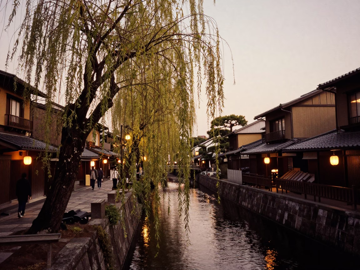 Kyoto Japan Evening Street Scene with Willow Tree and Traditional Architecture in in Kyoto, Japan