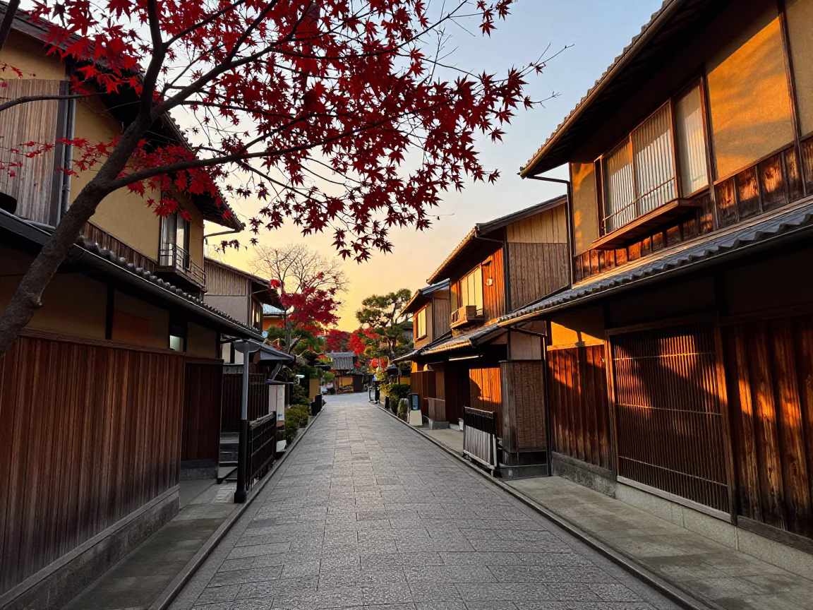 Kyoto Japan Sunset Street Scene with Autumn Maple Leaves and Traditional Wooden Architecture in in Kyoto, Japan