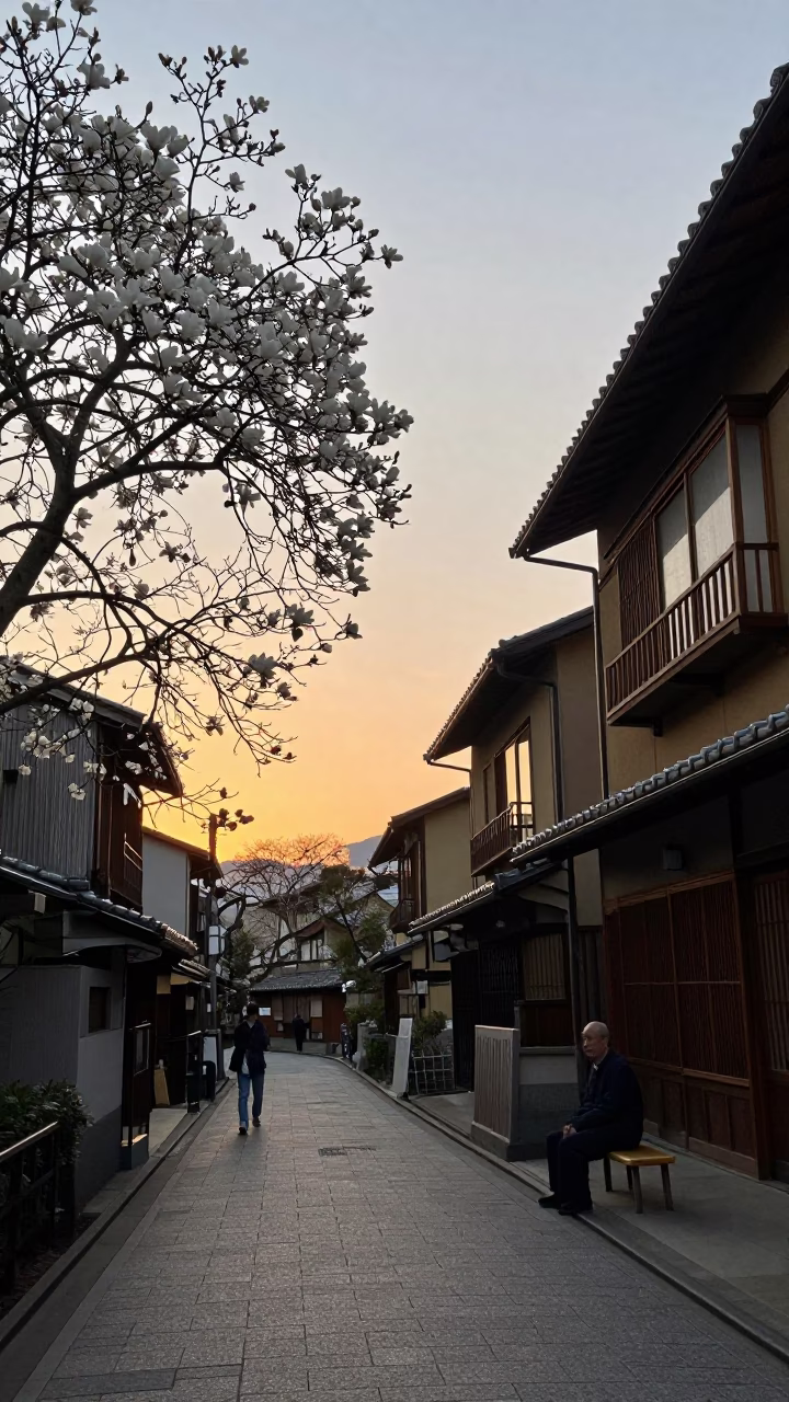 Kyoto Street Scene at Dusk with Magnolia Tree and Folded Bamboo Parasol in in Kyoto, Japan