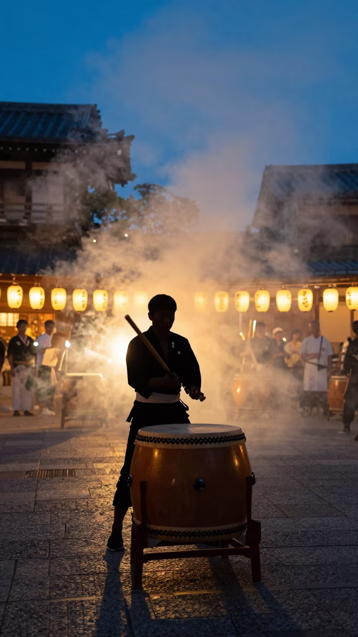 Kyoto Taiko Drummer Silhouette in Twilight Smoke in at a public square during a festival in Kyoto