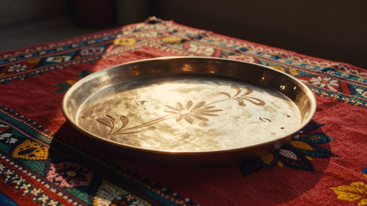 Lacquer Tray on Festival Mat in Bahawalnagar in on a textile-covered table in Bahawalnagar