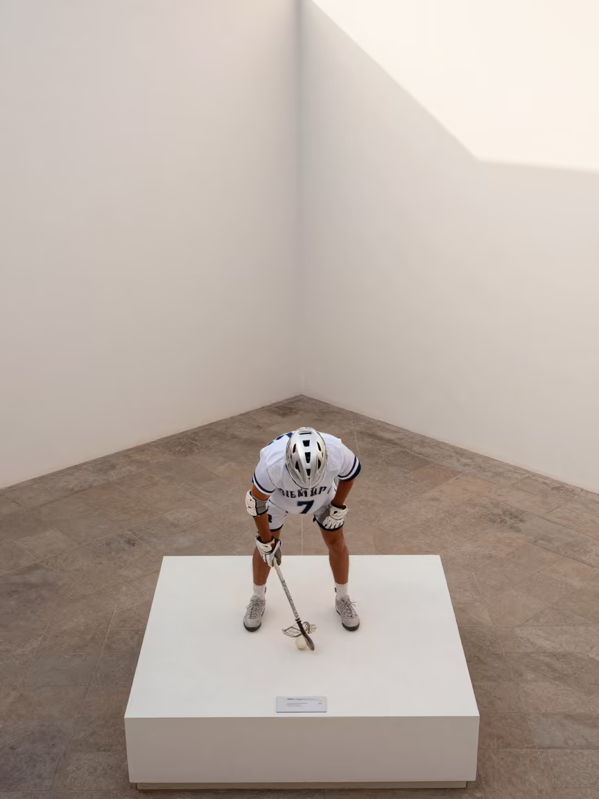 Lacrosse Player Cradling Ball on Museum Plinth Tepic in on a museum plinth in Tepic