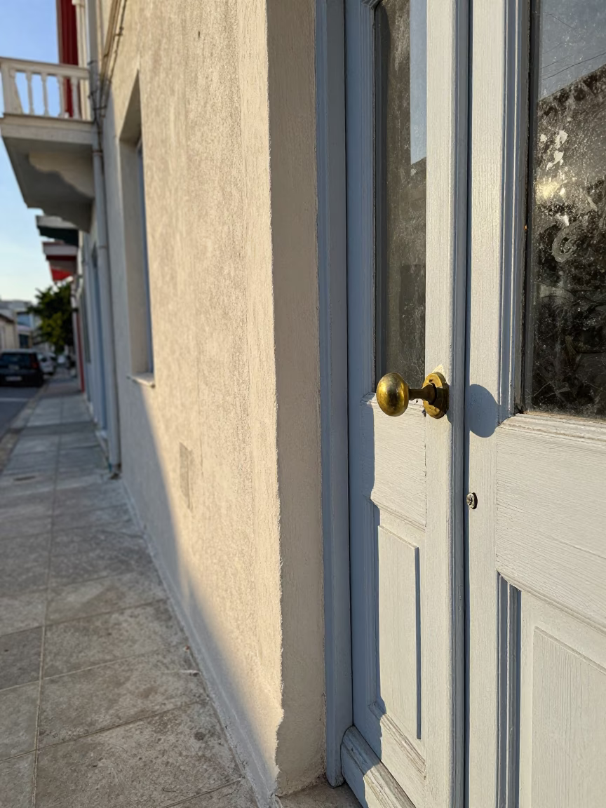Late Afternoon Athens Street Scene with Doorknob and Glass Vases in in Athens, Greece
