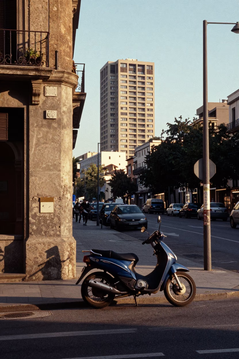 Late Afternoon Barcelona Street Scene with Motorcycle and Blue Porcelain Bowl in in Barcelona, Spain