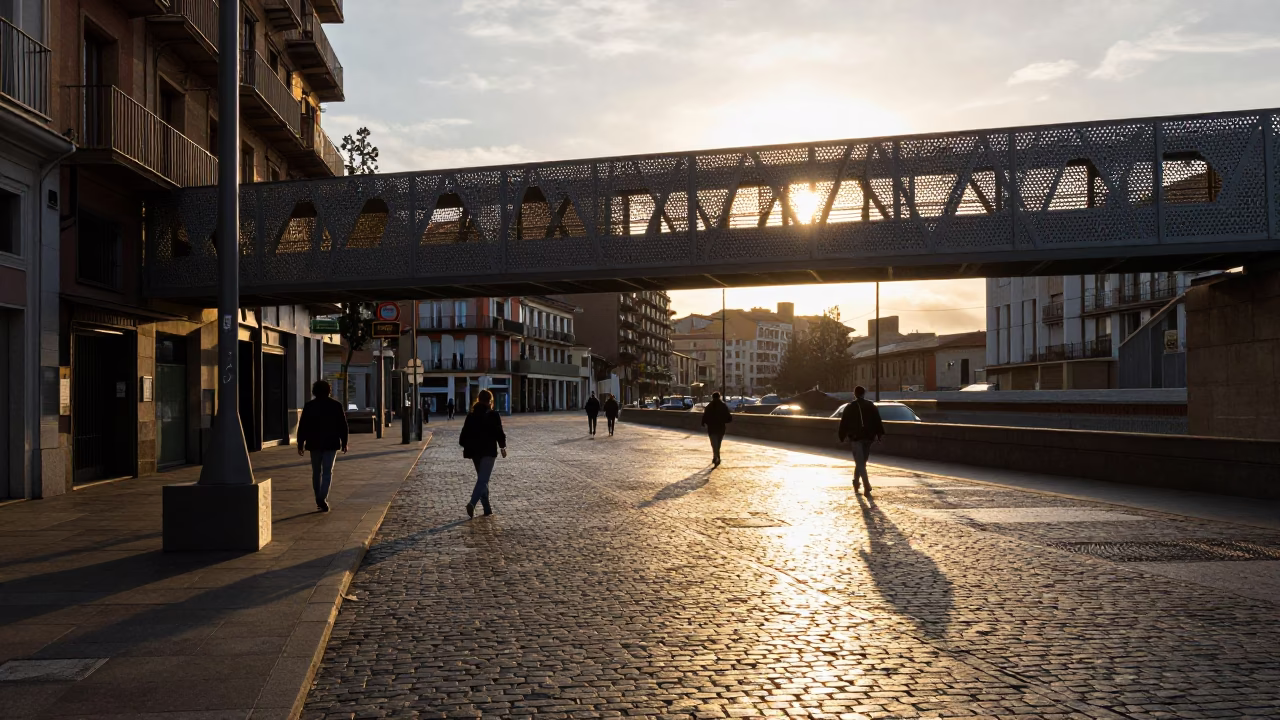 Late Afternoon Bilbao Street Scene with Pedestrian Overpass and Wet Footsteps in in Bilbao, Spain