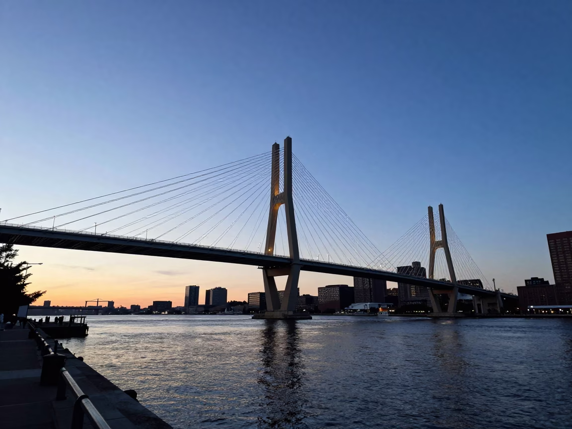 Late Afternoon Boston Harbor View with Cable-Stayed Bridge Illumination in in Boston, Massachusetts, United States
