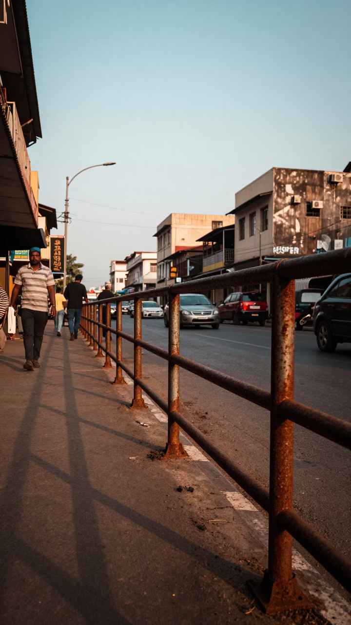 Late Afternoon Chennai Street Scene with Rusty Railings and Table Fans in in Chennai, India