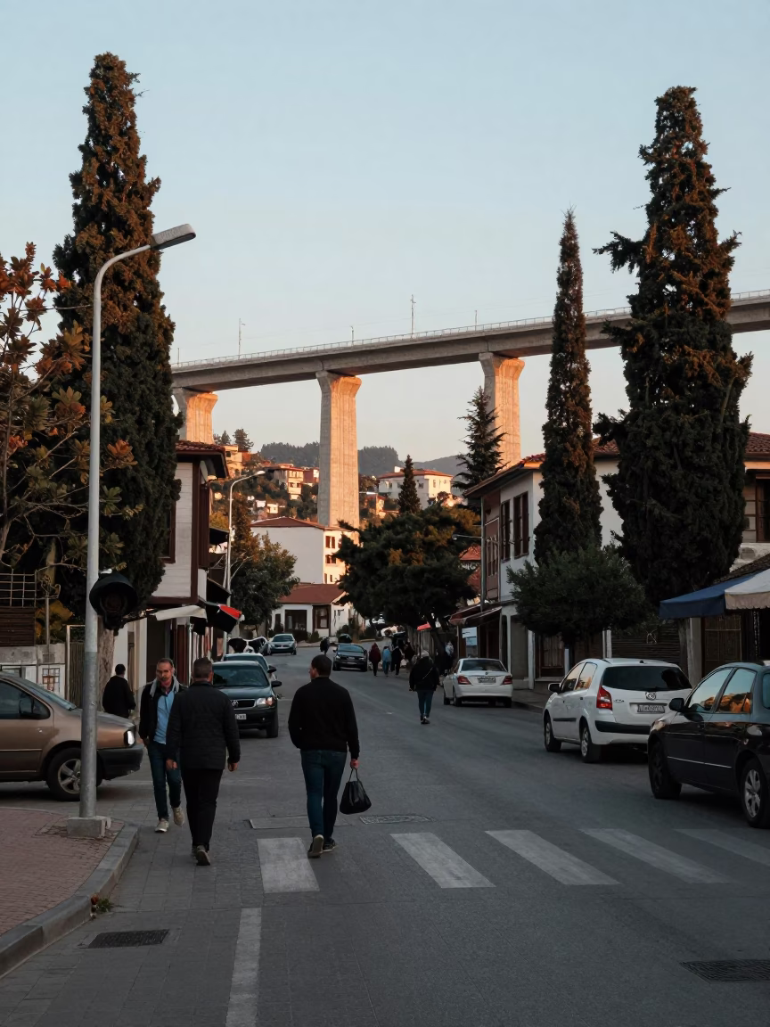 Late Afternoon Izmir Street Scene with Viaduct and Cypress Trees in in Izmir, Turkey