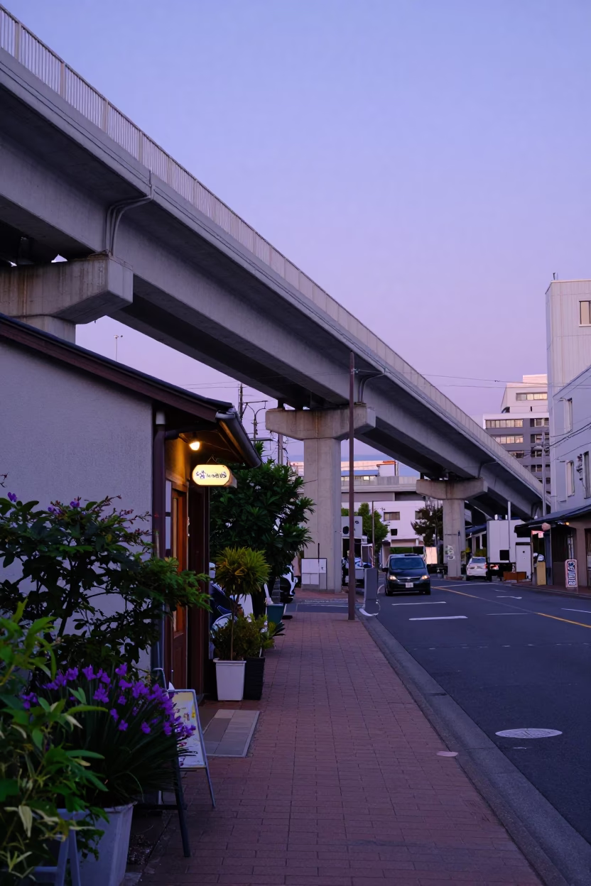 Late Afternoon Sapporo Street Scene with Houseplants and Violet Sky Overpass in in Sapporo, Japan