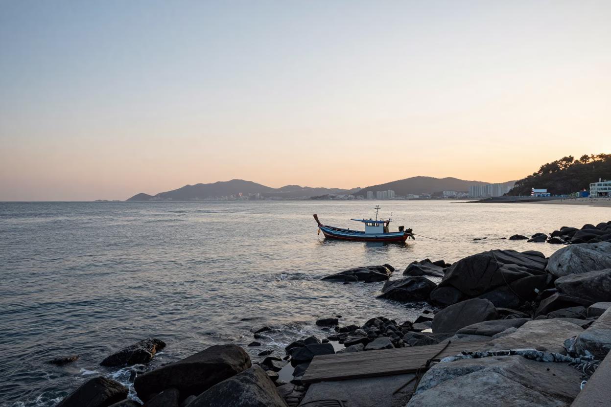 Late Afternoon Sea View from Busan Jagalchi Market Exterior with Longtail Boat in in Busan, South Korea
