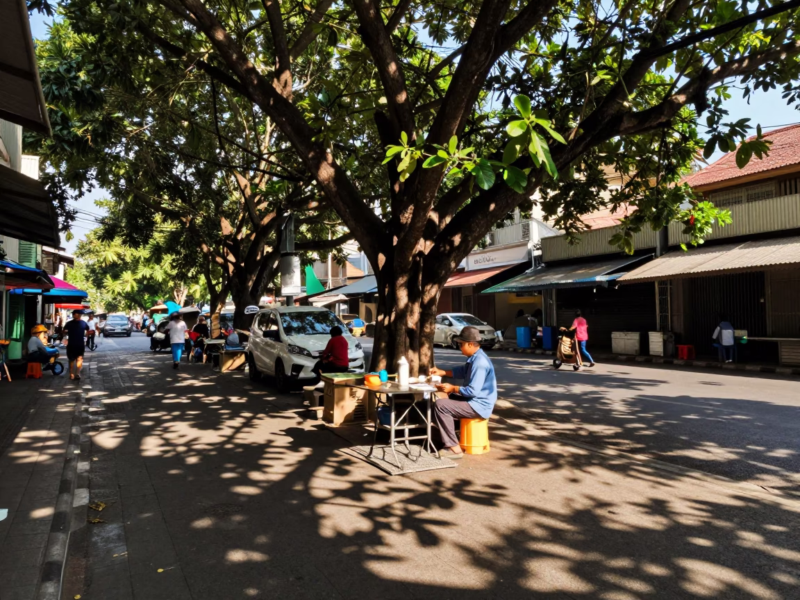 Late Afternoon Street Scene in Bangkok with Leaf Shadows and Urban Life in in Bangkok, Thailand
