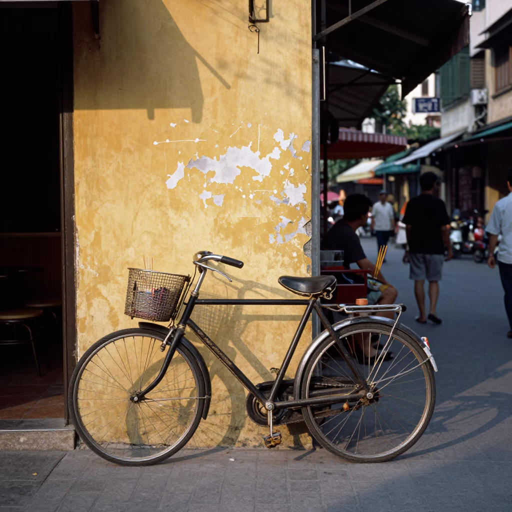 Late Afternoon Street Scene in Hanoi Vietnam with Bicycle and Incense Holder in in Hanoi, Vietnam