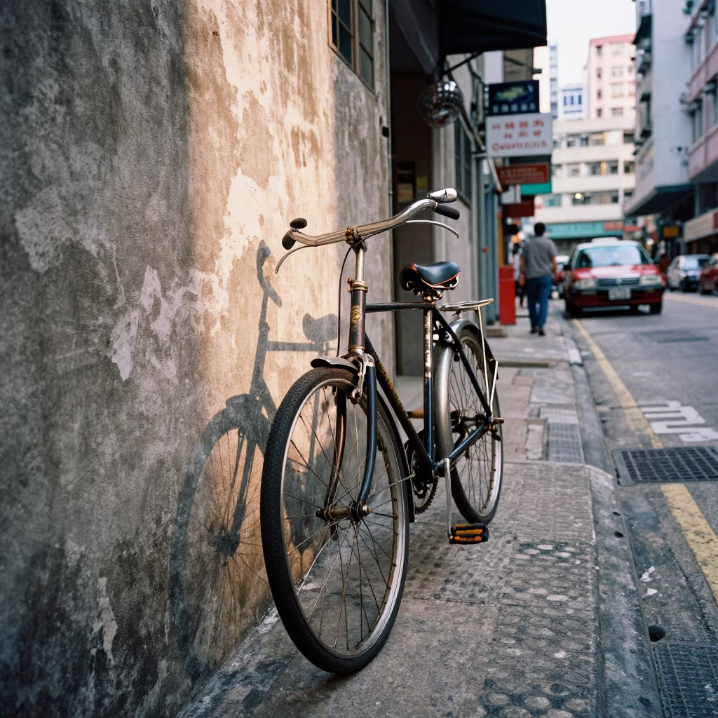 Late Afternoon Street Scene in Hong Kong with Vintage Bicycle and Brushed Steel Mirror in in Hong Kong, Hong Kong