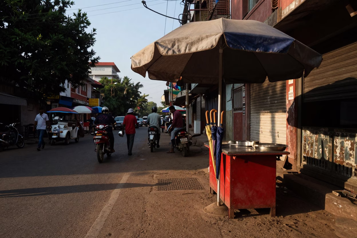 Late Afternoon Street Scene in Hyderabad India with Umbrella Stand and Wicker Shadows in in Hyderabad, India