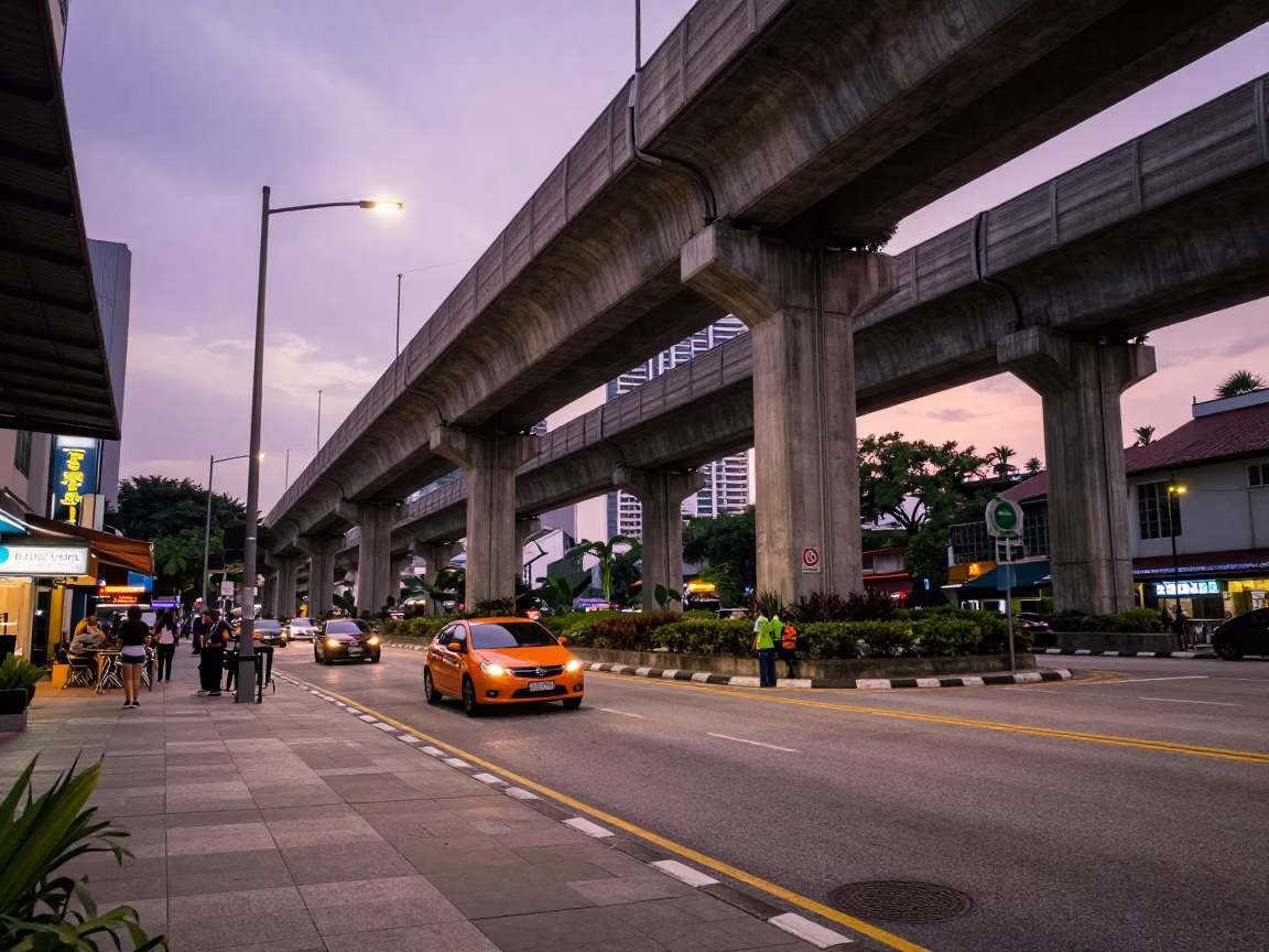 Late Afternoon Street Scene in Kuala Lumpur with Overpass and Local Activity in in Kuala Lumpur, Malaysia
