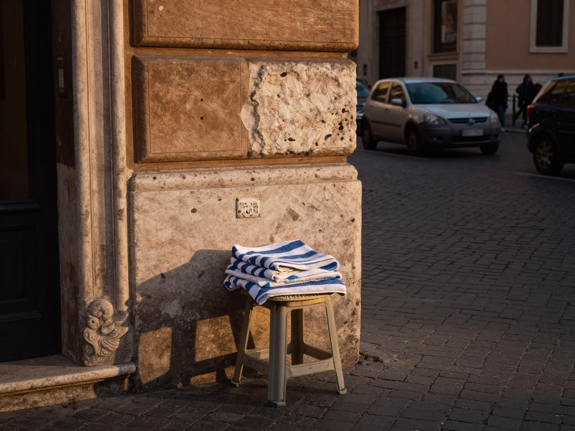 Late Afternoon Street Scene in Rome Italy with Striped Towel and Camp Stool in in Rome, Italy