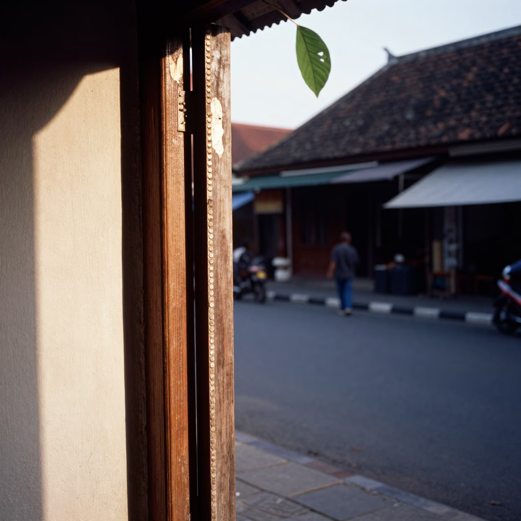 Late Afternoon Street Scene in Yogyakarta Indonesia with Doorframe and Leaf Shadows in in Yogyakarta, Indonesia