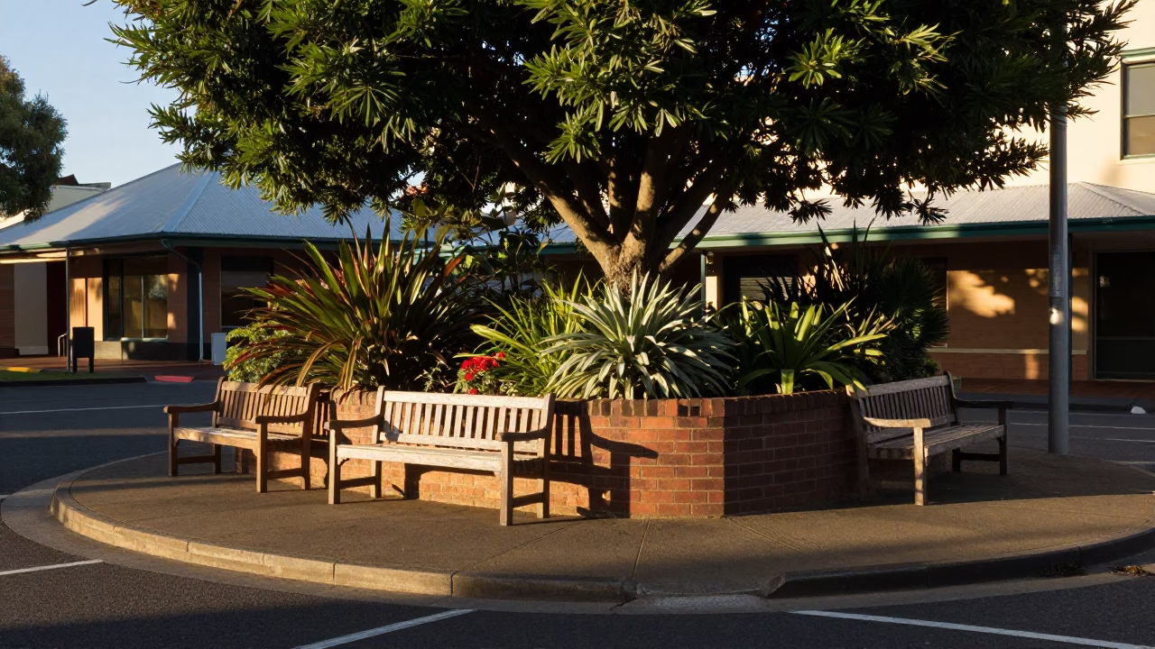 Late Afternoon Sunlight on Perth Street Corner with Garden Benches and Traffic Shadows in in Perth, Western Australia, Australia