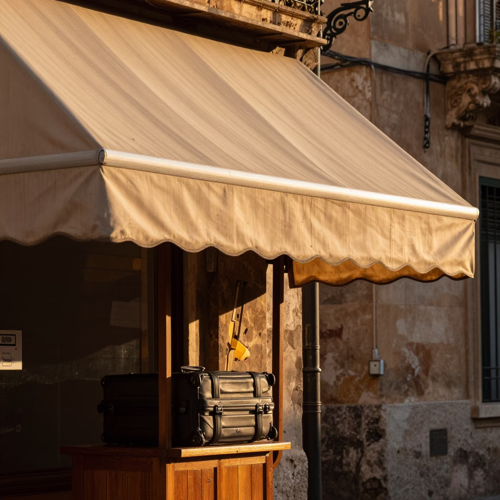 Late Afternoon Sunlight Striking Hotel Awning and Valet Stand in Palermo Italy Street Scene in in Palermo, Italy