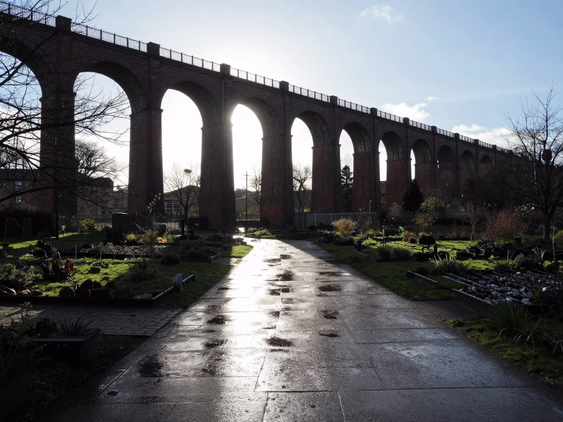 Late Afternoon Viaduct Shadow Cutting Across Rain-Washed Liverpool Allotment Gardens in in Liverpool, United Kingdom