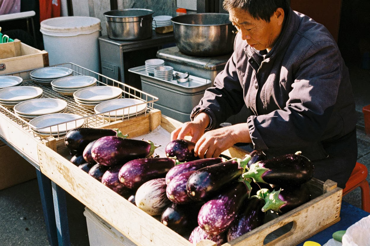 Late Morning Market Scene in Beijing with Eggplants and Kitchenware in in Beijing, China