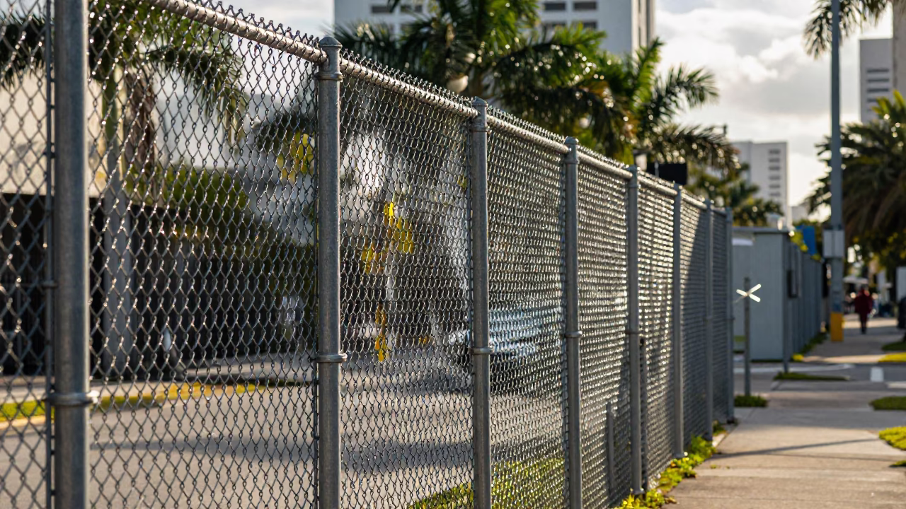 Late Morning Miami Street Scene with Substation Fence and Warning Placards in Florida in in Miami, Florida, United States