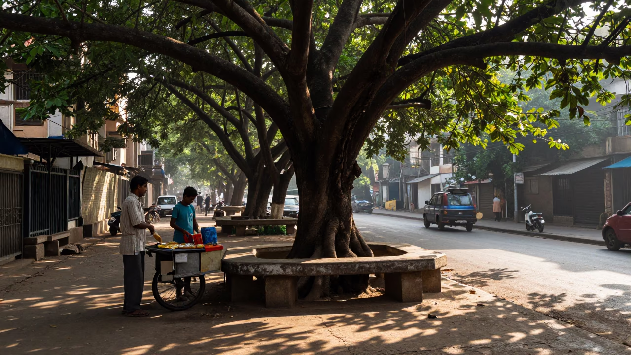Late Morning Mumbai Street Scene with Chaat Vendor and Vintage Motorcycle in in Mumbai, India