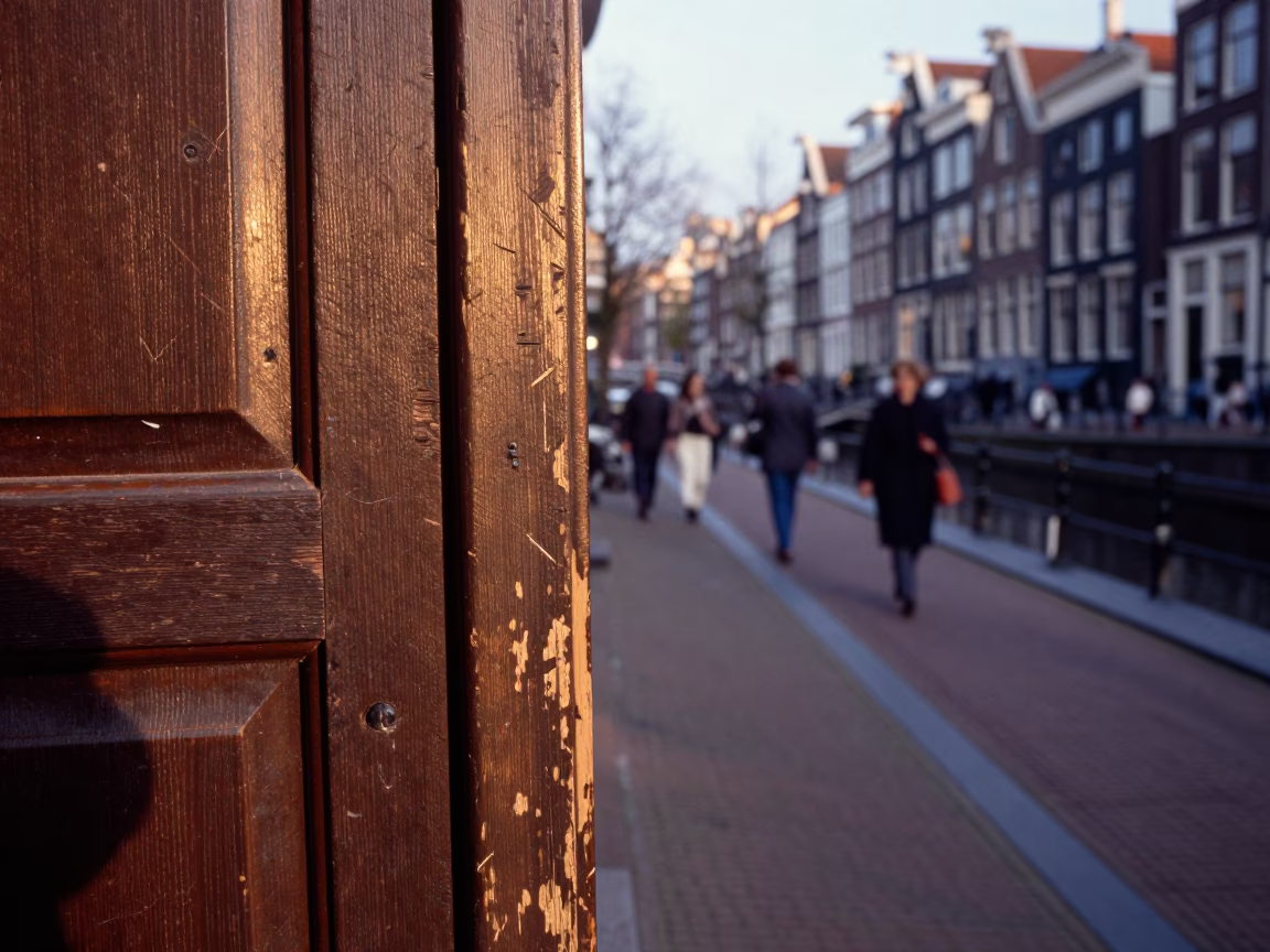 Late Morning Street Scene in Amsterdam with Worn Wood Details and Window Light in in Amsterdam, Netherlands