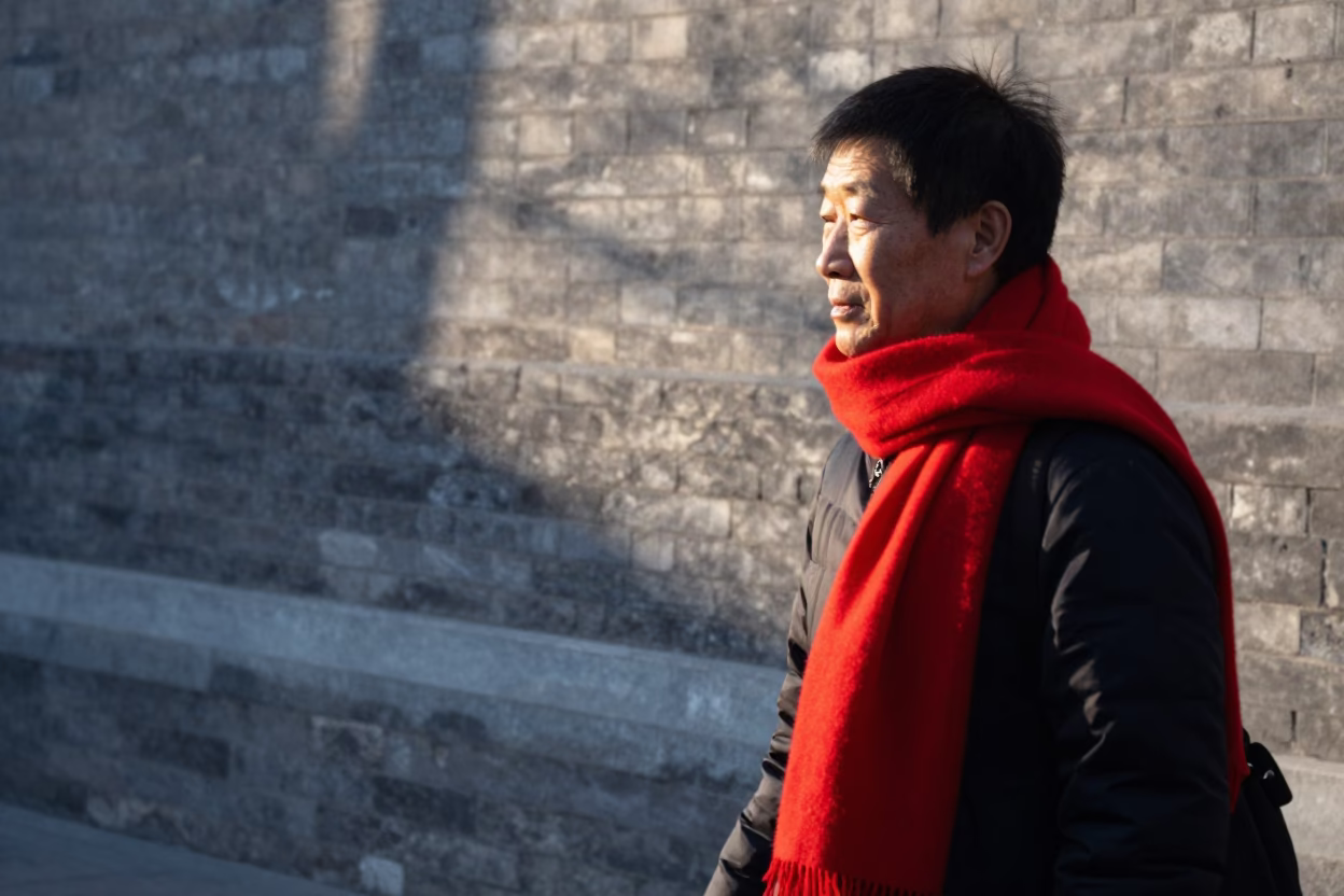 Late Morning Street Scene in Beijing China with Red Scarf and Urban Architecture in in Beijing, China