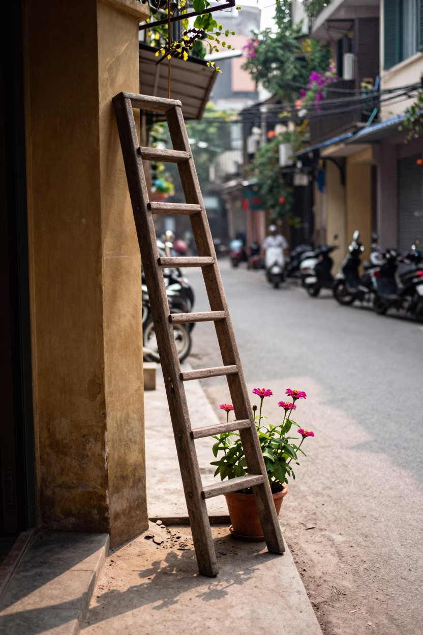 Late Morning Street Scene in Hanoi Vietnam with Wooden Ladder and Zinnias in in Hanoi, Vietnam