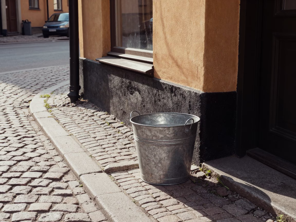 Late Morning Street Scene in Stockholm Sweden Featuring Metal Bucket and Urban Life in in Stockholm, Sweden