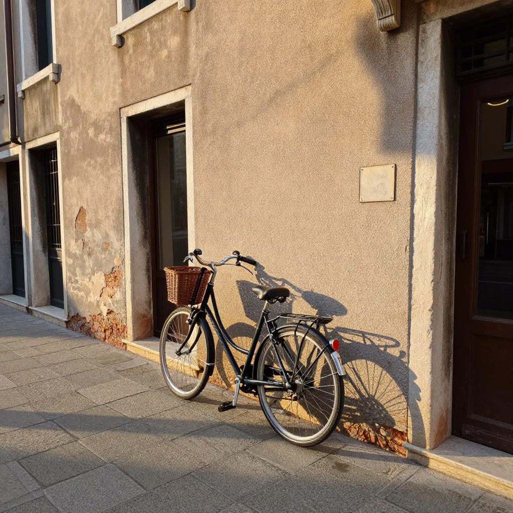 Late Morning Street Scene in Venice Italy With Bicycle Leaning Against Cafe Wall in in Venice, Italy