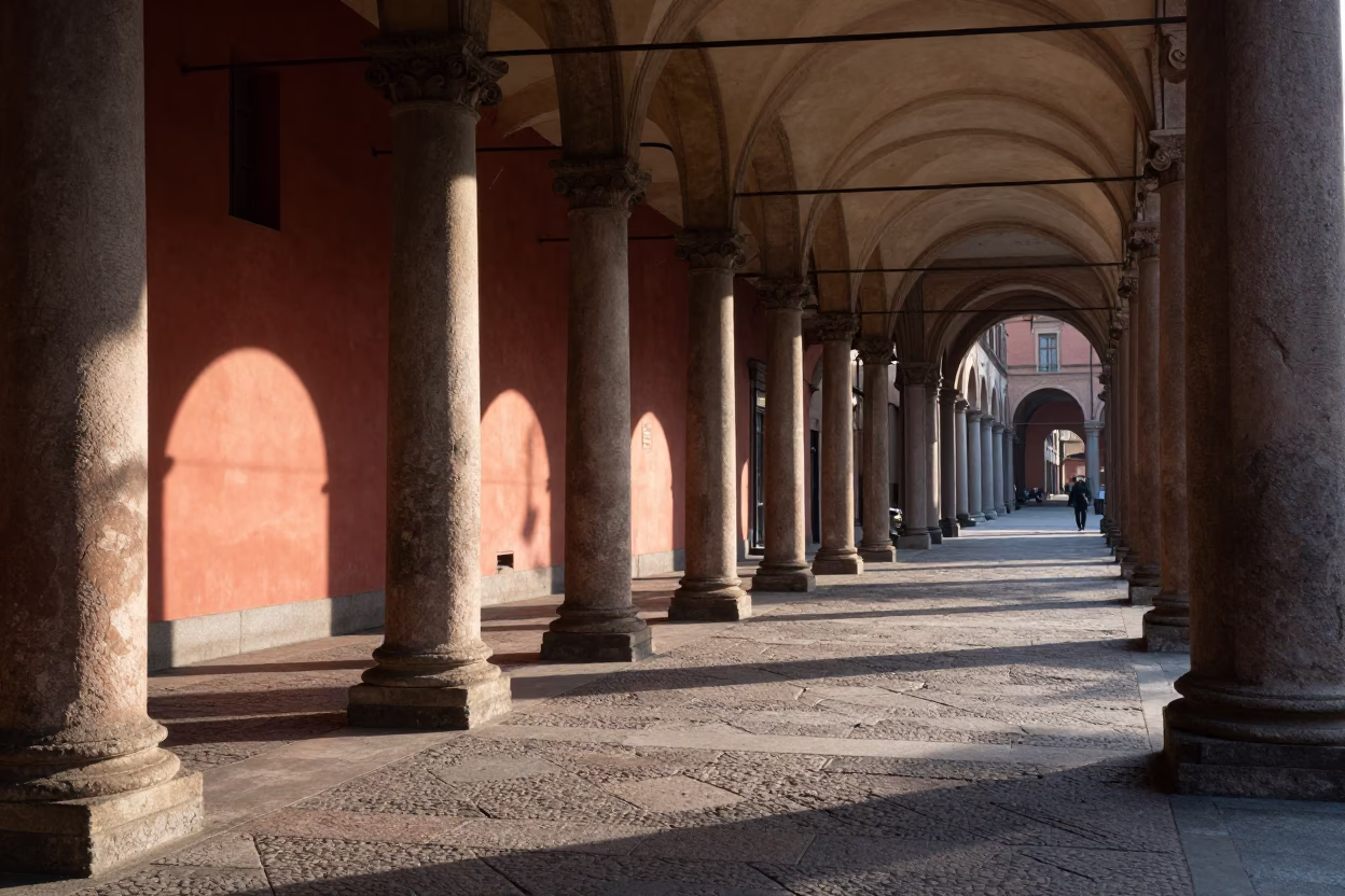 Late Morning Sunlight on Bologna Porticoes with Red Lacquered Wood Detail in in Bologna, Italy