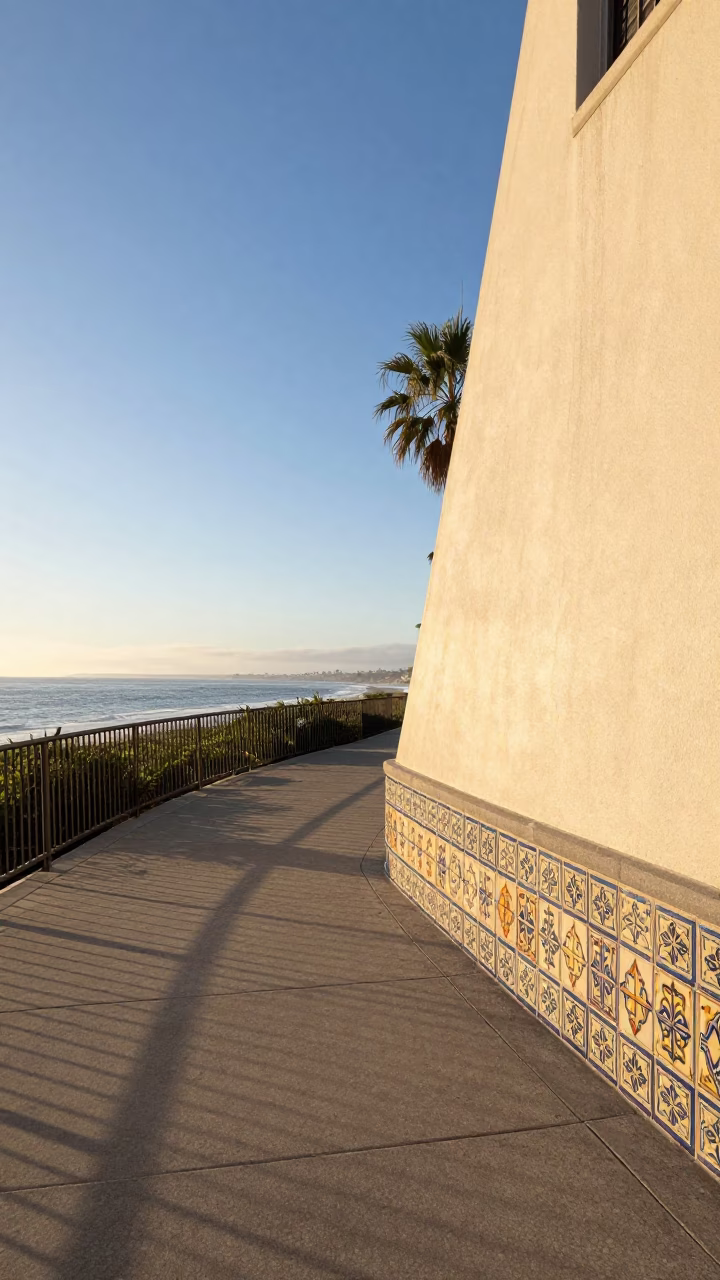 Late Morning Sunlight on San Diego Coastal Walkway with Majolica Tiles and Bridge Infrastructure in in San Diego, California, United States