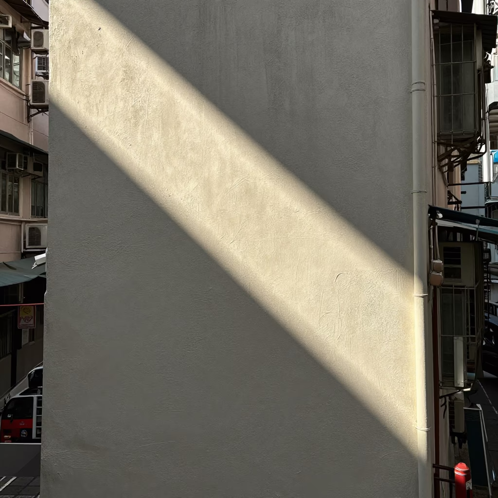 Late Morning Sunlight on Weathered Plaster Wall in Hong Kong Neighborhood in in Hong Kong, Hong Kong