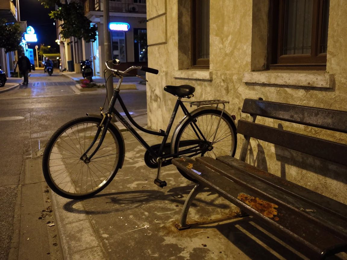Late Night Athens Street Scene with Vintage Bicycle and Rusty Bench Under Neon Lights in in Athens, Greece