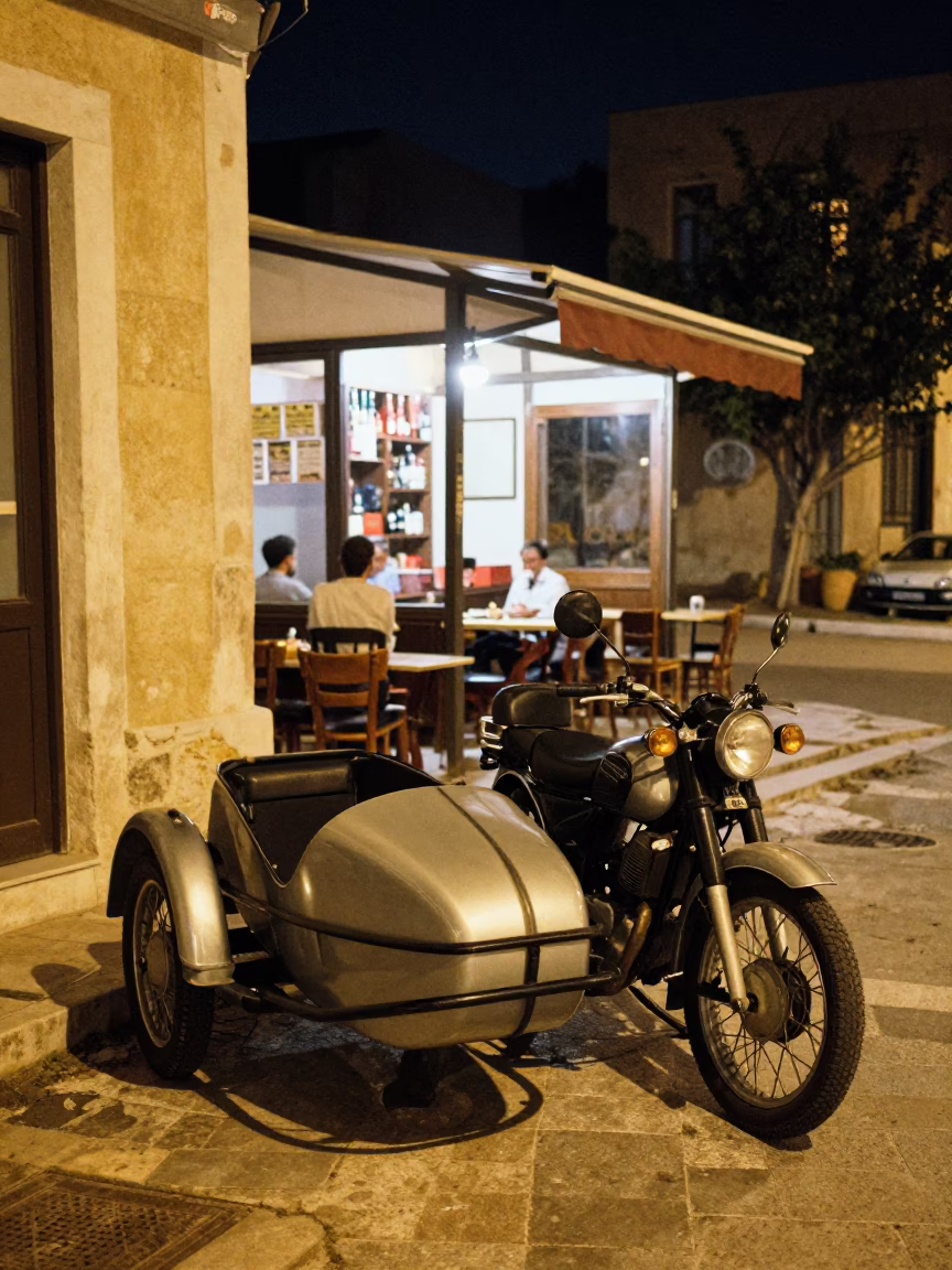 Late Night Athens Street Scene with Vintage Motorcycle Sidecar and Metal Stools in in Athens, Greece