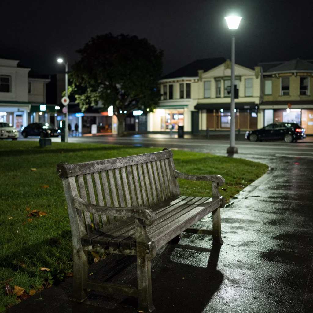 Late Night Auckland Street Scene with Park Bench and Railway Viaduct Background in in Auckland, New Zealand