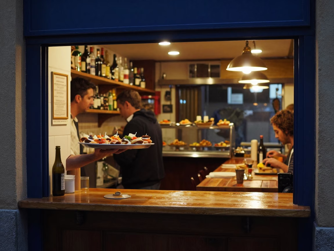 Late Night Barcelona Tapas Bar Interior with Pintxos Tray and Grease Sheen in in Barcelona, Spain