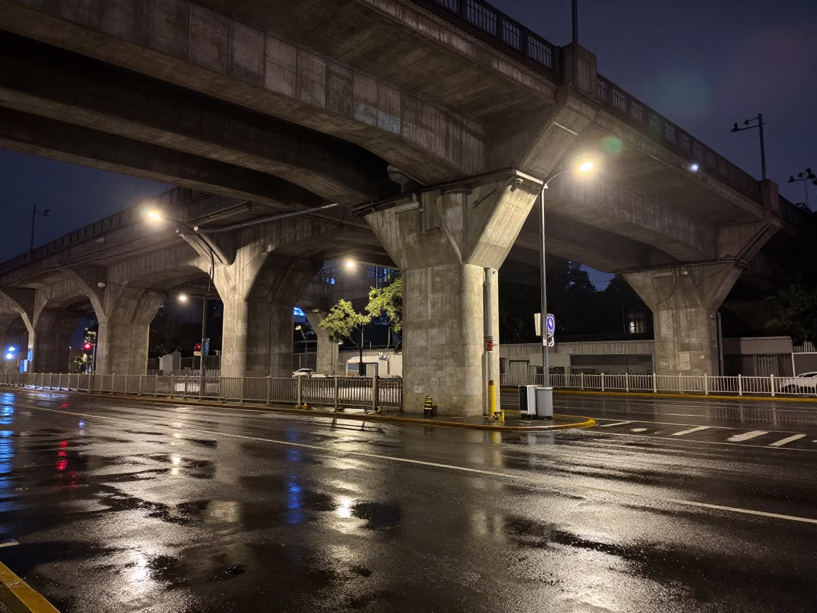 Late Night Beijing Street Scene with Railway Viaduct Arches and Passing Train in in Beijing, China
