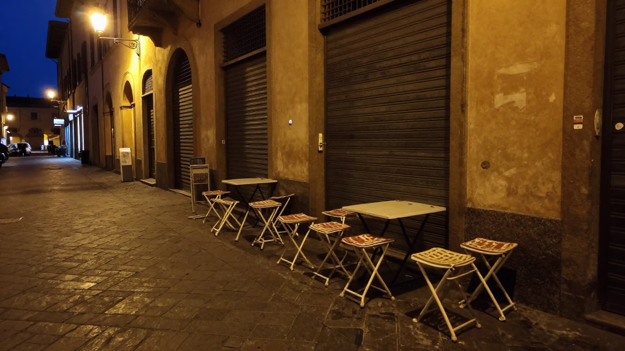 Late Night Bologna Street Scene with Folding Stools and Harmonica in in Bologna, Italy