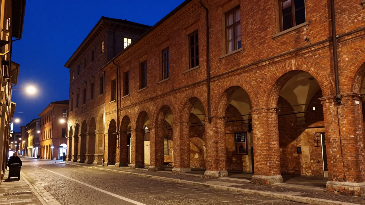 Late Night Bologna Street Scene with Historic Architecture and Urban Lighting in in Bologna, Italy