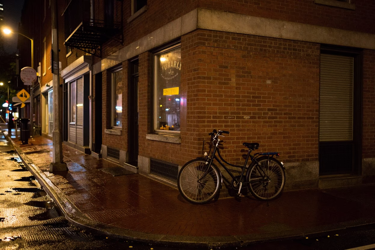 Late Night Boston Street Scene with Bicycle and Wet Cobblestones in in Boston, Massachusetts, United States